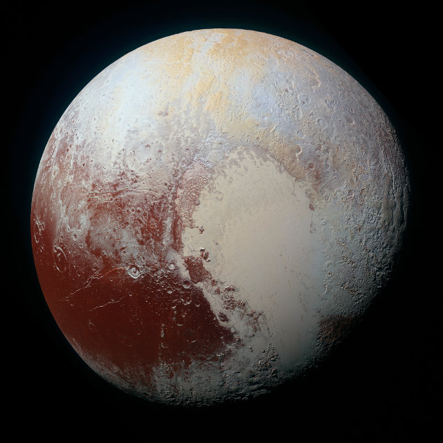 The new picture of Pluto's surface with enhanced colors (Image NASA/JHUAPL/SwRI)