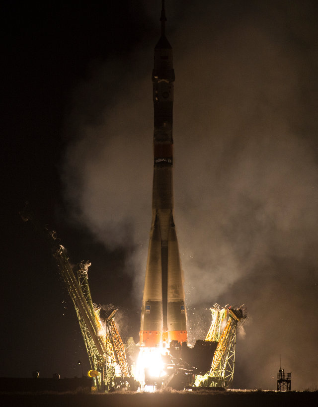 The Soyuz TMA-20M spacecraft blasting off atop a Soyuz rocket (Photo NASA/Aubrey Gemignani)