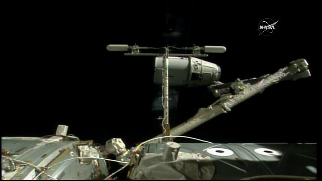 SpaceX Dragon cargo spacecraft released from the International Space Station's robotic arm (Image NASA TV)