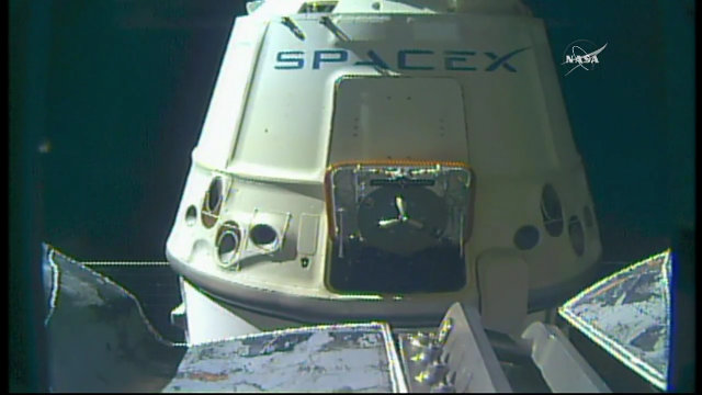 SpaceX Dragon cargo spacecraft released from the International Space Station's robotic arm (Image NASA TV)