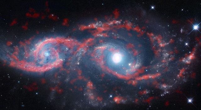 IC 2163 and NGC 2207 (Image M. Kaufman; B. Saxton (NRAO/AUI/NSF); ALMA (ESO/NAOJ/NRAO); NASA/ESA Hubble Space Telescope)
