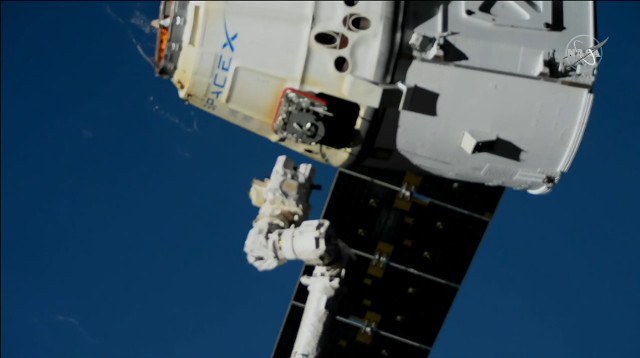 The Dragon cargo spacecraft leaving the International Space Station to end its CRS-19 mission (Image NASA TV)