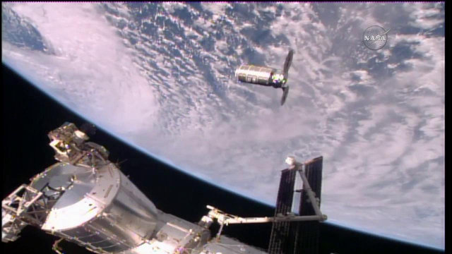 The Cygnus space cargo ship approaching the International Space Station (Image NASA TV)