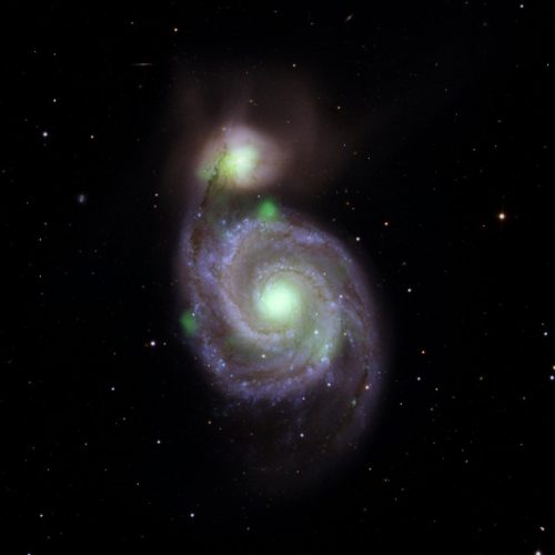 Surprising high-energy X-ray emissions from the Whirlpool Galaxy and its small companion