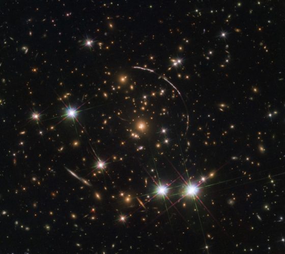 The image of an ancient galaxy multiplied by a gravitational lens
