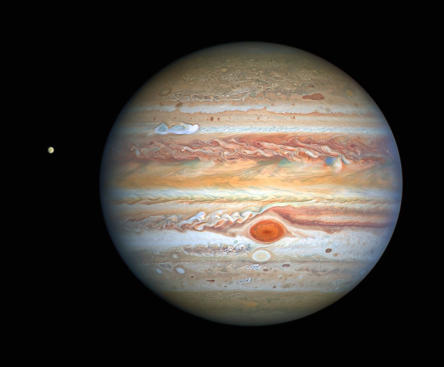 Jupiter and Europa seen by Hubble (Image NASA, ESA, A. Simon (Goddard Space Flight Center), and M. H. Wong (University of California, Berkeley) and the OPAL team.)
