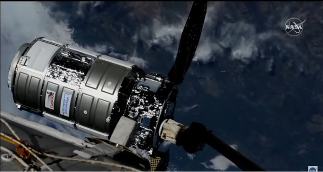 The Cygnus S.S. Ellison Onizuka captured by the Canadarm2 robotic arm (Image NASA TV)