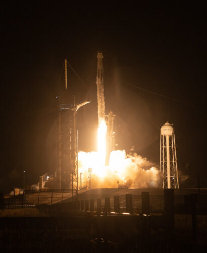 The Crew Dragon Endurance spacecraft blasting off atop a Falcon 9 rocket (Photo NASA/Joel Kowsky)