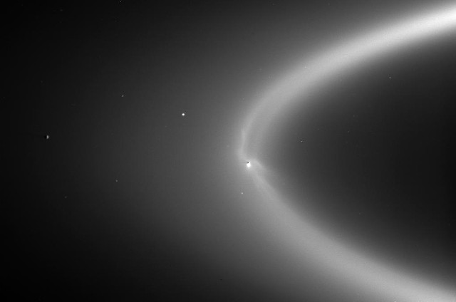 Enceladus and Saturn's E ring (Image NASA/JPL/Space Science Institute)