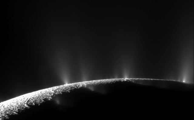 Enceladus and some of its geysers (Image NASA/JPL/Space Science Institute)
